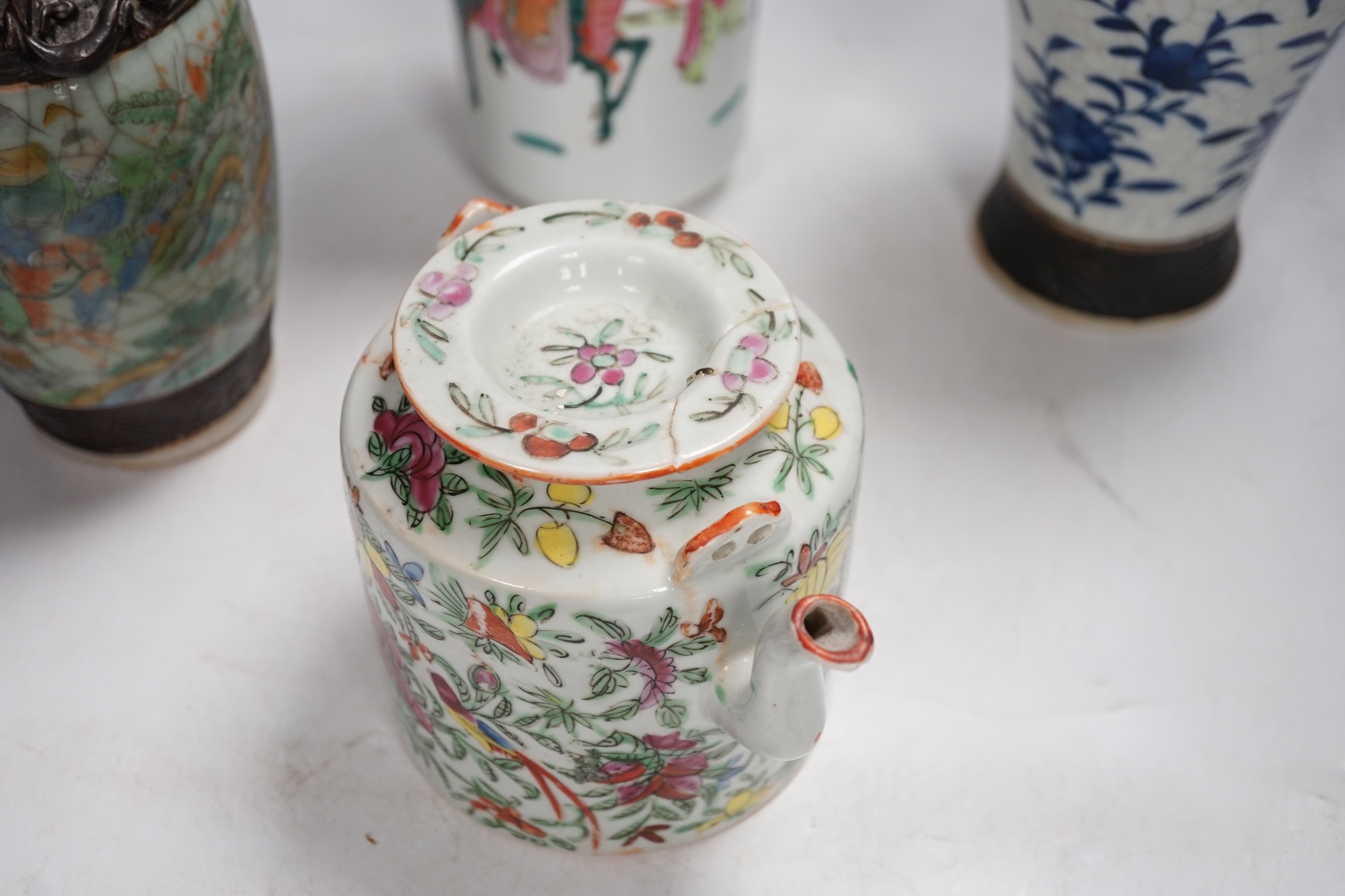 Three pairs of Chinese vases, a teapot, two bowls and a pair of miniature Satsuma vases, tallest item crackleware vases and covers 32cm high. Condition - poor